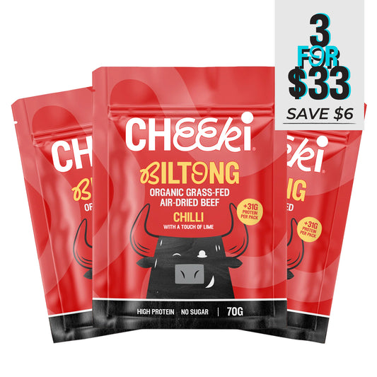 Three packs of Cheeki Biltong Chilli flavor on a white background with promotional text.